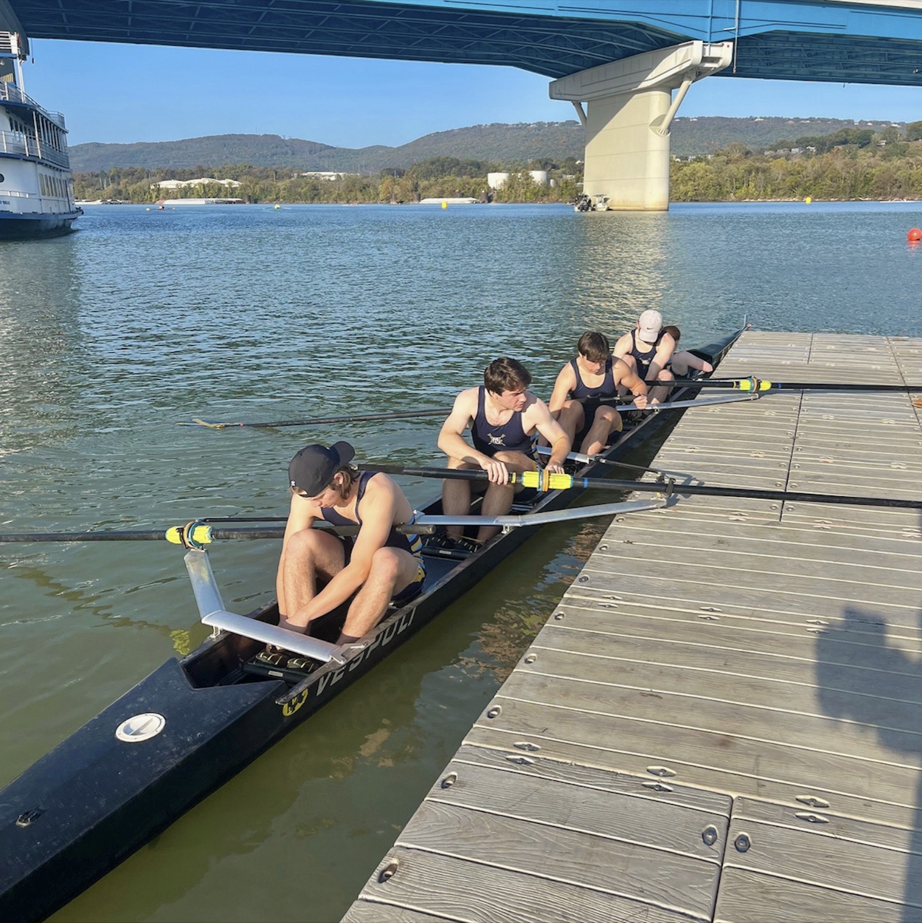 Marquette's men's four ties in at the dock before a race.